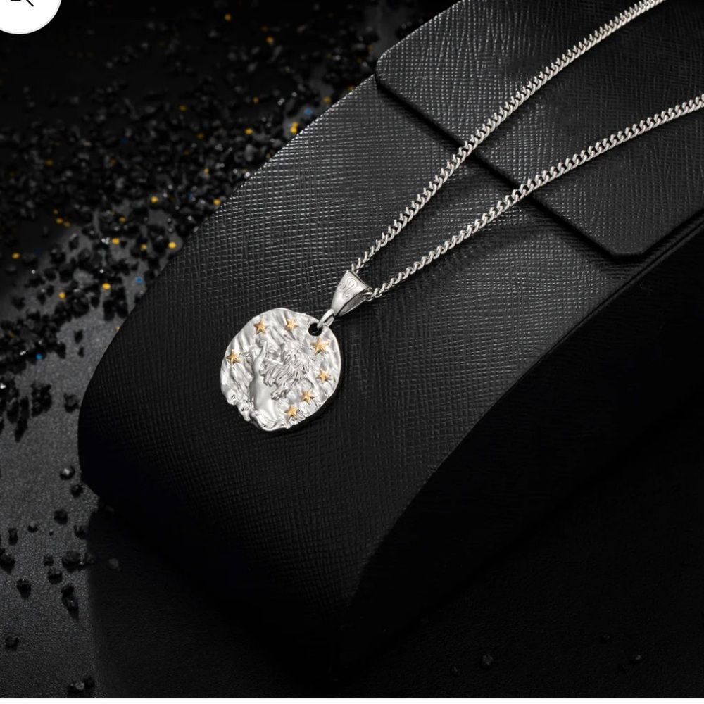 Murtoo Necklace Of Amulets Leo Unisex NWT
Color: Silver and Star Golden Plated